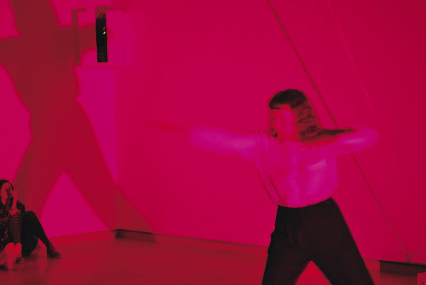 Agatha Gothe-Snape, <em>Inexhaustible present</em>, 2013, dance developed and choreographed by Brooke Stamp, digital video (dual channel, silent, colour, 13 minutes 48 seconds), fabric, rope, travertine weights, metal fixing, brass plaque, dimensions variable, performance and installation view, Art Gallery of New South Wales, Sydney, 2013, photograph: Christopher Snee, courtesy the artist, AGNSW and The Commercial Gallery, Sydney