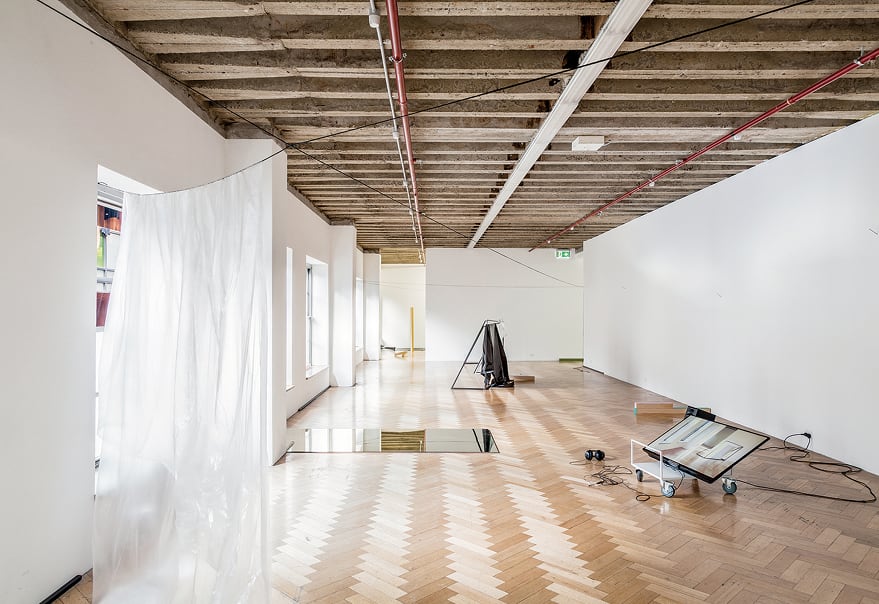Helen Grogan, <em>THREE ADJOINING SPACES WITH MANIFOLD EDGES</em> 2015. Installation view. Image courtesy the artist and West Space. Photo credit: Christo Crocker (Note: This work was exhibited concurrently with Geoff Robinson’s project room overlay / 5 weeks / thursdays 6–7pm / accumulation visible in this photograph as acrylic painted pine timber and loudspeakers)