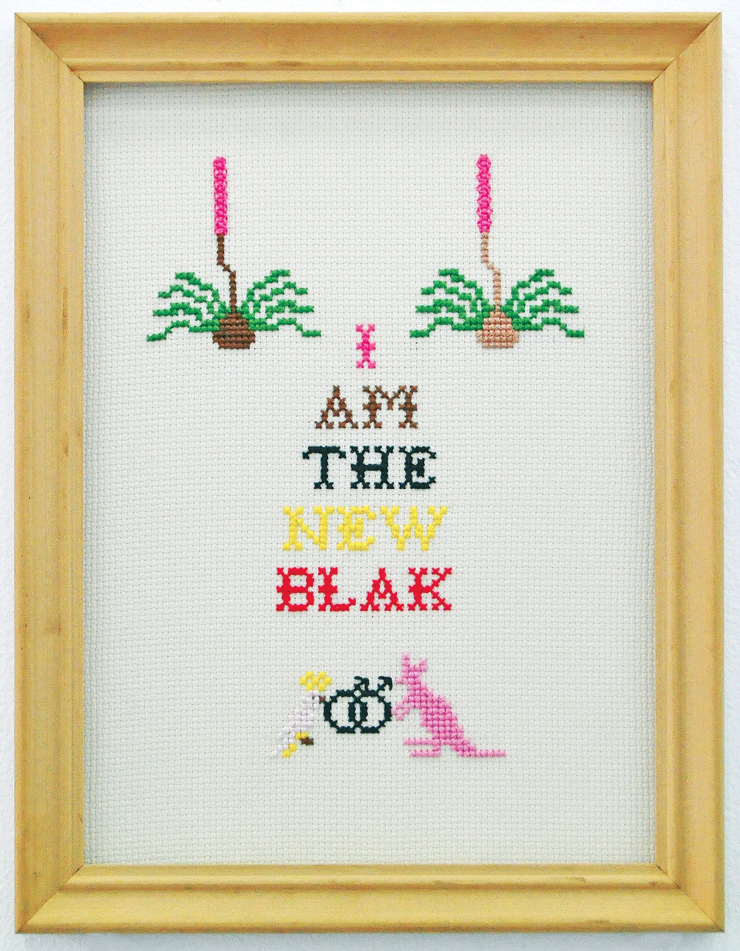 Dale Harding, <em>Blakboy, Blakboy, the colour of your skin is your pride and joy</em> 2012. From the Colour By Number series. Cotton thread, cloth, found timber frame. 26 × 34 × 3 cm. Collection of Tony Albert, Warrang Sydney