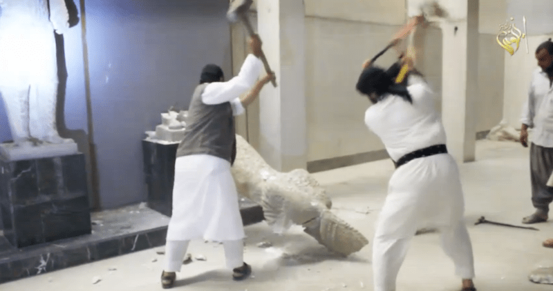 Screenshot of ISIS video showing destruction of King Uthal statue at Mosul Museum. Courtesy Morehshin Allahyari.