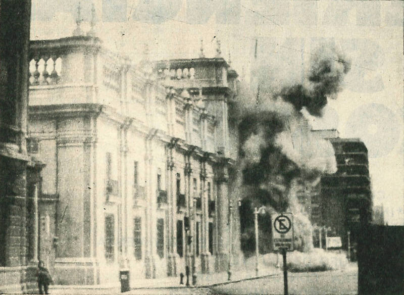 A plume of smoke escapes Chile’s Presidential Palace as bombing commences, 11 September 1973.