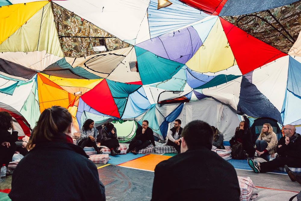 Keg de Souza, 'Redfern School of Displacement' (2016), performance, tents, tarps, hessian sacks, piping, plaid laundry bags, found and recycled materials. Image courtesy of the artist. Photo credit: Document Photography.