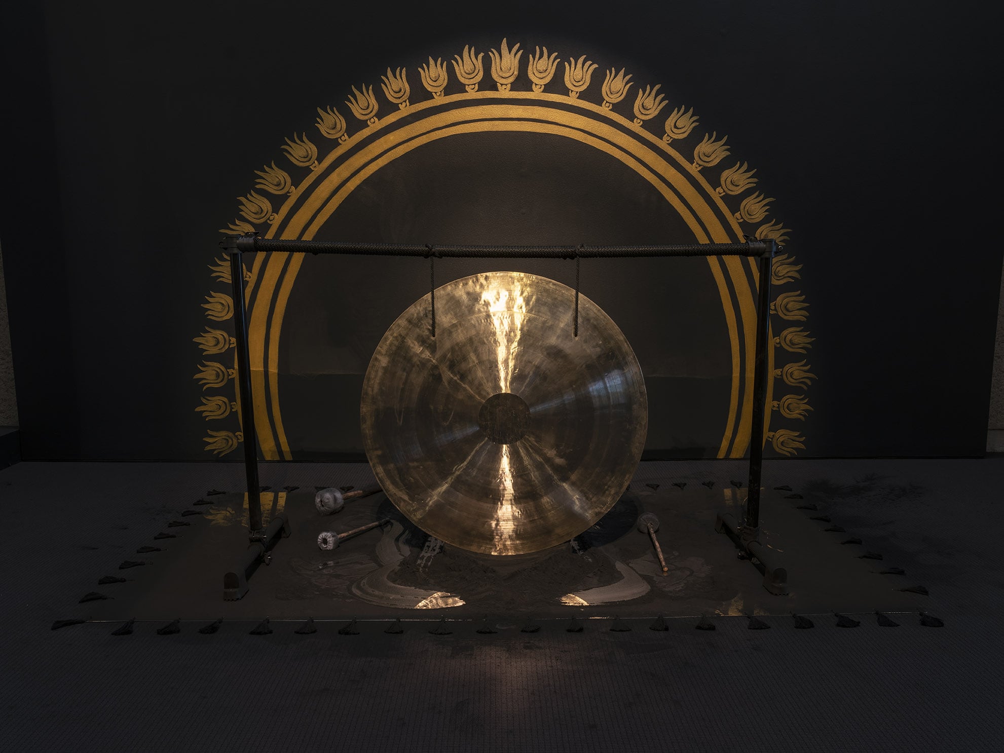 Image 01: Naomi Blacklock, 'Aflame, A Singing Sun' (2019), gong, gong stand, acrylic paint, stainless steel, cotton, charcoal, contact microphones, speakers, mixer. Performance commissioned for Second Sight opening, UQ Art Museum, 1 March 2019. Courtesy of the artist. Photo: Carl Warner