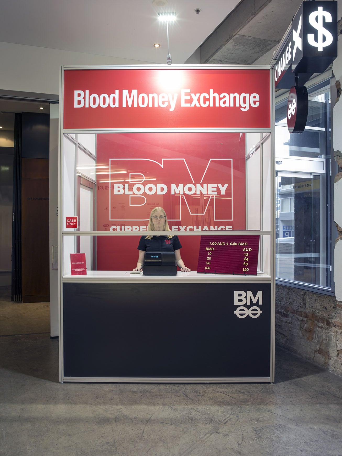 Image 02: Ryan Presley *Blood Money Currency Exchange Terminal* 2018, installation, series of four limited-edition prints, performance, 100x200x300cm. Installation view, Institute of Modern Art. Photo: Carl Warner.