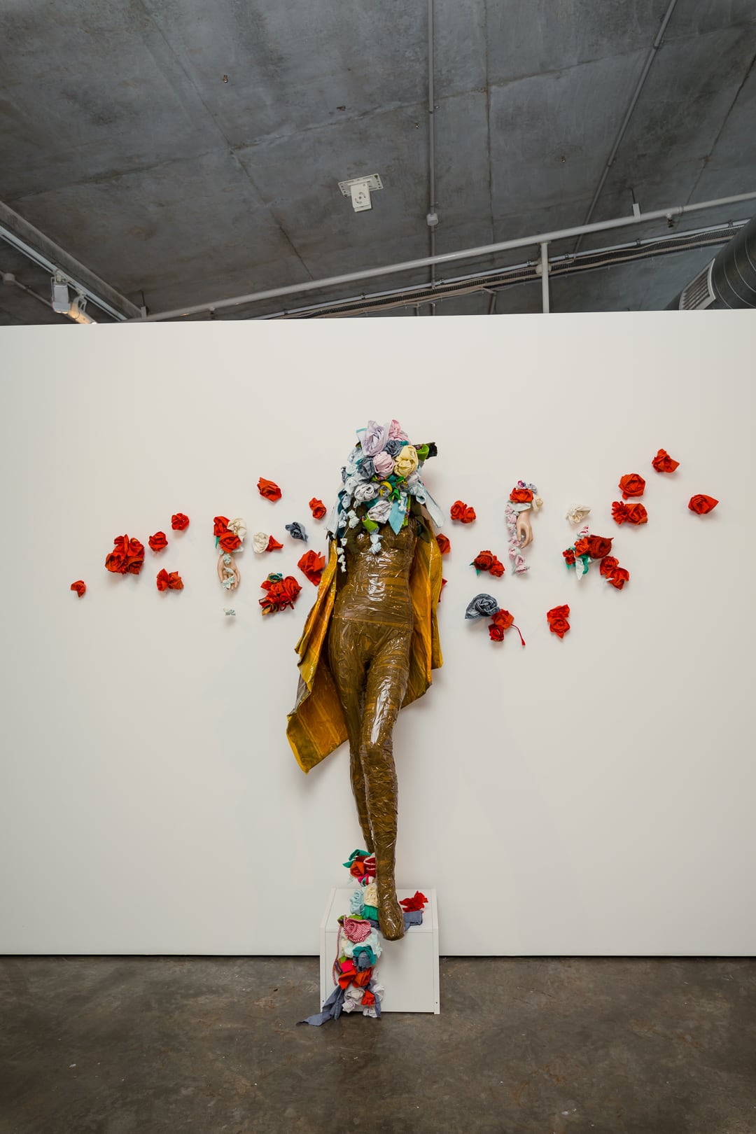 Image 04: L-R Marikit Santiago *Mary Manananggal* 2018, second-hand children's garments, towels, linen, found mannequin, dress-maker pins, thread, hot glue gun, packing tape, masking tape, dimensions variable. Image: Document Photography. Courtesy of the artist and Verge Gallery.