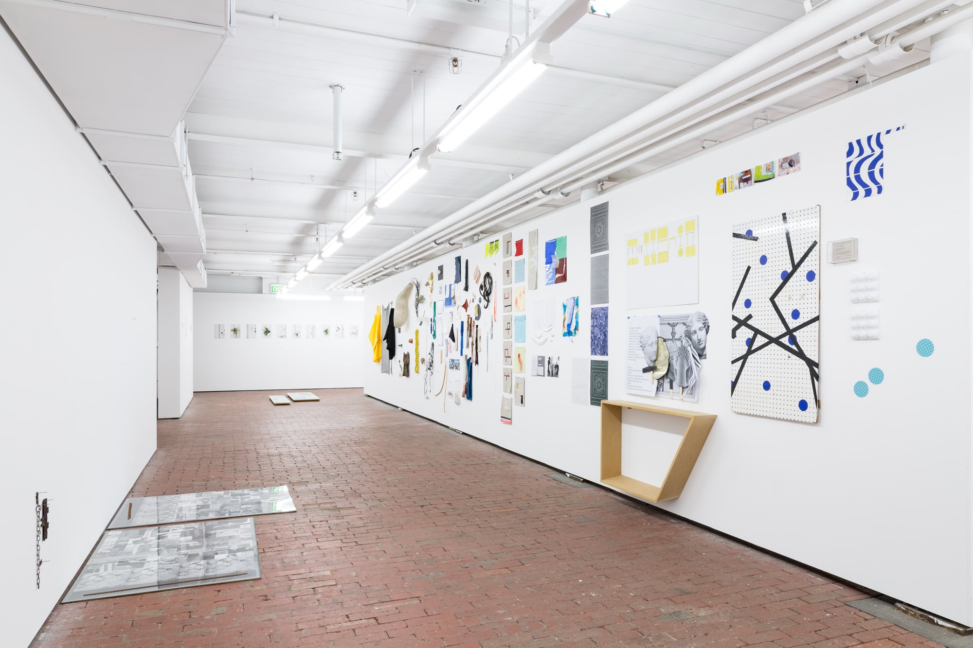 Image 04: SHE TURNS installation view. Left floors: Rebecca Thomas *Tracing over yours, twice* 2017, peg board, paper, acrylic and found objects. Rear: Meredith Turnbull *Flowers and Mirrors* 2017, archival pigment prints on Hahnemühle photo rag paper. Floor: Meredith Turnbull *Paper Portraits* 2017, glass, paper, particleboard, acrylic paint, aluminium. Wall: Meredith Turnbull *Material/Fragments* 2017 with material contributions from Fiona Abicare, Kay Abude, Damiano Bertoli, Terri Bird, Ross Coulter, Sarah crowEST, Andrea Eckersley, Debris Facility Pty Ltd, Christopher L G Hill, Jenny Hector, John Meade, Mascha Moje, Spiros Panigirakis, Sean Peoples, Lisa Radford, Masato Takasaka, Salote Tawale, Sarah Ujmaia, Manon van Kouswijk and Behn Ja Woods. Image courtesy the artist. Photo: Vivian Cooper Smith.